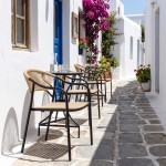 Πολυθρόνα στοιβαζόμενη "MARIN" μέταλλο σε μαύρο χρώμα και pe rattan σε φυσική απόχρωση 56x60x78